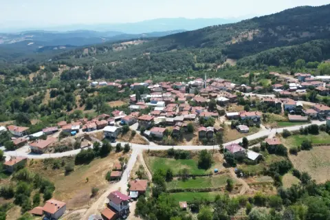 Keles'te 7 km asfalt başladı: Yol 9 metreye genişliyor